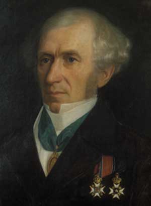 Maleri av mann i sjakett, han har to medaljer på venstre bryst og en stor medalje med bredt grønt silkebånd rundt halsen