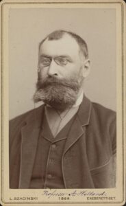 Portrett av mann med skjegg og briller